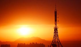 Signal Tower Under The Morning Glow