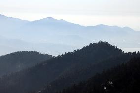 Morning Mist Wraps Around Mengshan Mountain