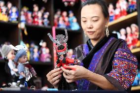 China Guizhou National Costume Doll