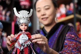 China Guizhou National Costume Doll