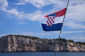 Kornati Islands National Park, The Kornati archipelago, sailing yacht, cruising, cruiser, sea, Croatian flag