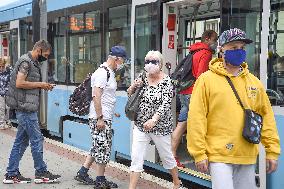 Public transport Ostrava, tram, people, face mask