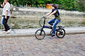 electric bike, electric powered bicycle, e-bike, cyclist, woman