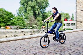 electric bike, electric powered bicycle, e-bike, cyclist, woman