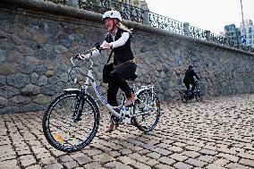 electric bike, electric powered bicycle, e-bike, cyclist, woman