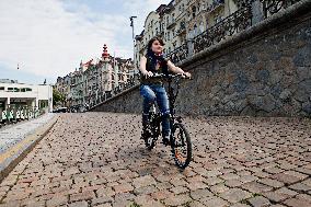electric bike, electric powered bicycle, e-bike, cyclist, woman
