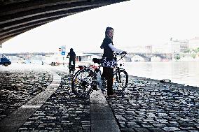 electric bike, electric powered bicycle, e-bike, cyclist, woman, Vltava river, cyclists