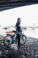 electric bike, electric powered bicycle, e-bike, cyclist, woman, Vltava river