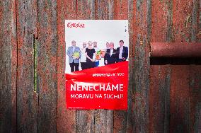 Czech communists (KSCM) poster for regional elections on the ruin door in Stalky