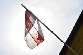 Brno City Council hanging the historic flag of Belarus in support of its citizens