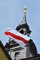 Brno City Council hanging the historic flag of Belarus in support of its citizens