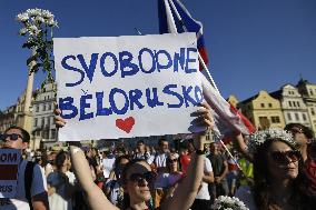 Crowds in Prague, express solidarity with Belarusian protest, people, rally, banners