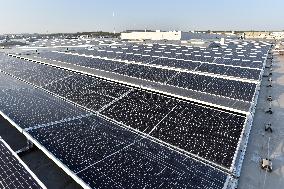 Thermo Fisher Scientific, solar power plant on roof, solar panels