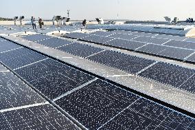 Thermo Fisher Scientific, solar power plant on roof, solar panels