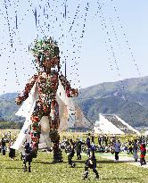 Giant puppet appears at Olympics cultural event in tsunami-hit city