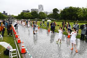 Downscaled Olympic torch relay in Hiroshima