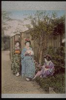 Girls taking a walk in a garden