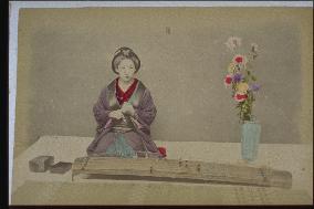 A koto and a woman
