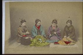 Women sewing clothes