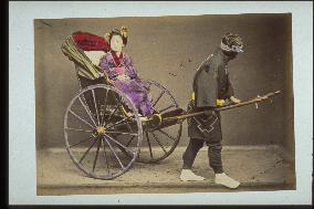 A woman on a jinrikisha