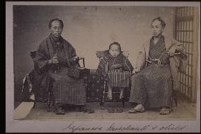 Japanese merchants and a child