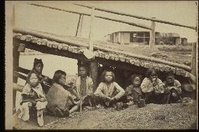 Beggars under a bridge