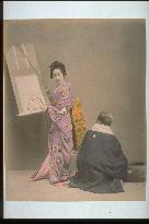 Woman hanging kakejiku,a hanging scroll