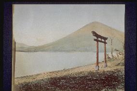 The torii of Chugu Shrine by Lake Chuzenji,and Mt. Nantai