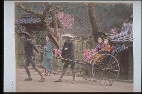 Women on jinrikishas