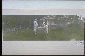 Foreigners in a garden of an inn