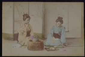 Women relaxing with tea and tobacco