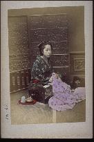 A woman doing needlework
