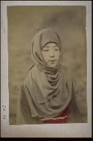 A woman wearing a hood of nobility