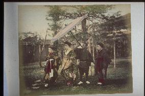 An oiran (courtesan) and her attendant