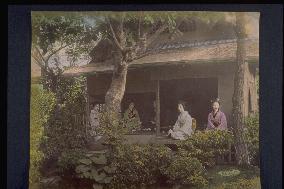 Girls relaxing on the veranda of a teahouse