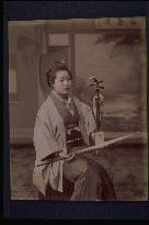 A woman with a shamisen