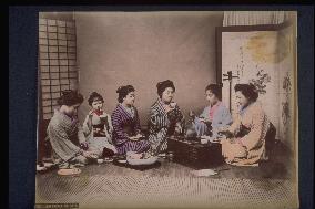 Women eating sushi