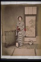 A woman with a shamisen