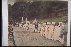 A scene of a procession at a shinto festival