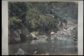 A fisherman in a mountain gorge