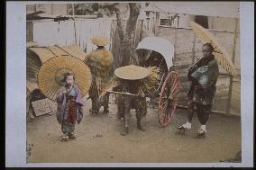 A jinrikisha on a rainy day