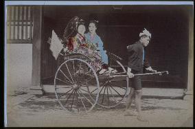 Women on jinrikishas