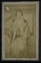 An onnagata (female impersonator in kabuki)