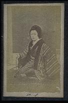 An onnagata (female impersonator in kabuki)