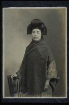 A woman wearing a shawl