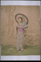 Woman putting up a parasol