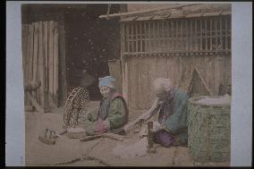 An old couple spinning cotton