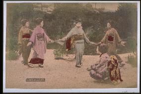 Woman playing a blindfold game (treasure mine and gold mine)