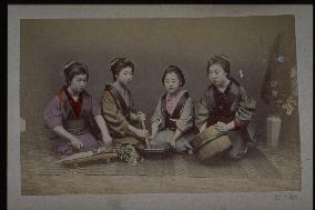 Women preparing for a meal