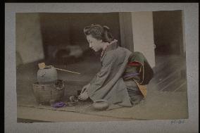 A woman making tea